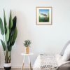 Framed painting of a pike hanging on a wall