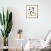 Framed painting of insects on a wall