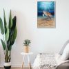 Painting of a sea turtle hanging in a room