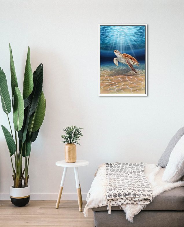 Painting of a sea turtle hanging in a room