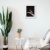Stag beetle painting hanging on a wall