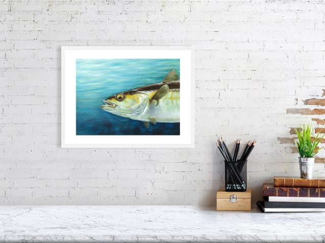 Pollock fish print in a white frame hanging on a wall.