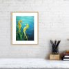 Seahorse print in oak frame