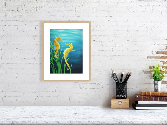 Seahorse print in oak frame