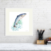 Salmon print in a white frame