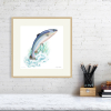Salmon print in an oak frame