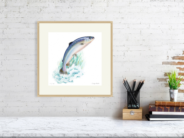 Salmon print in an oak frame