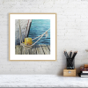 Boat mooring print in a white frame
